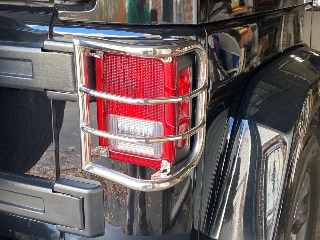 RedRock Wrap-Around Tail Light Guards; Stainless Steel (07-18 Jeep Wrangler JK)