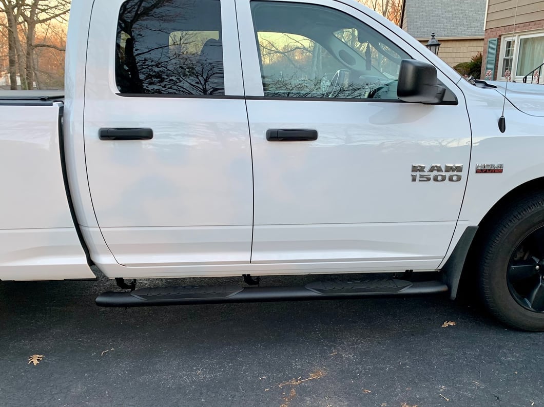 RAM Licensed by RedRock 5-Inch Oval Bent End Side Step Bars with Ram Logo; Textured Black (09-18 RAM 1500 Quad Cab)