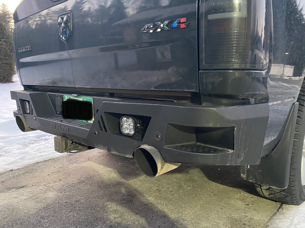RAM Licensed by RedRock Extreme HD Rear Bumper with RAM Logo; Textured Black (09-18 RAM 1500)