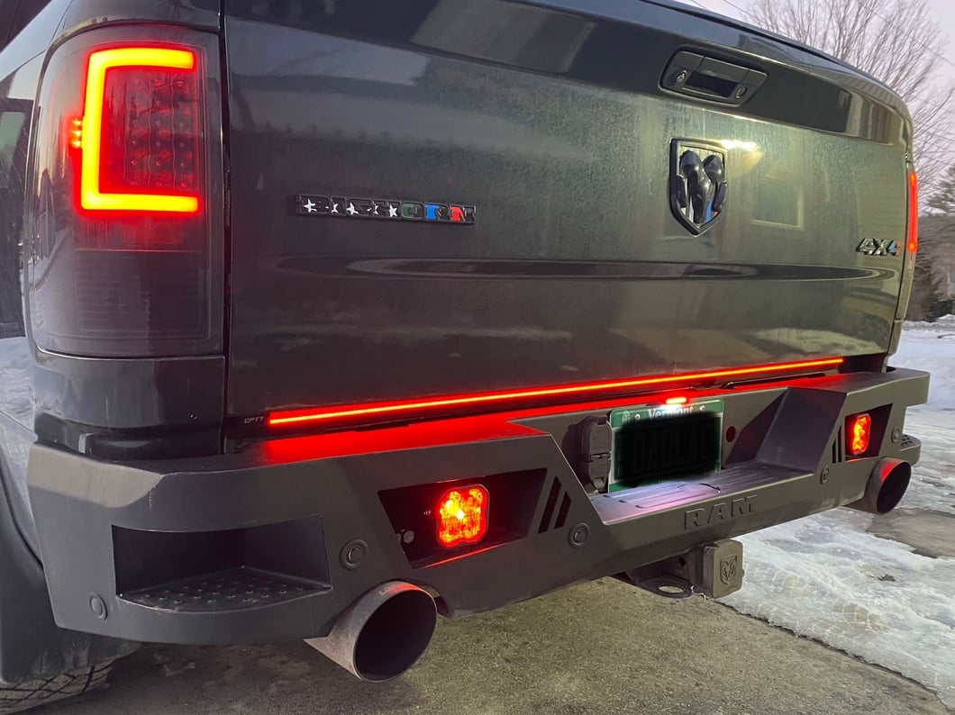 RAM Licensed by RedRock Extreme HD Rear Bumper with RAM Logo; Textured Black (09-18 RAM 1500)