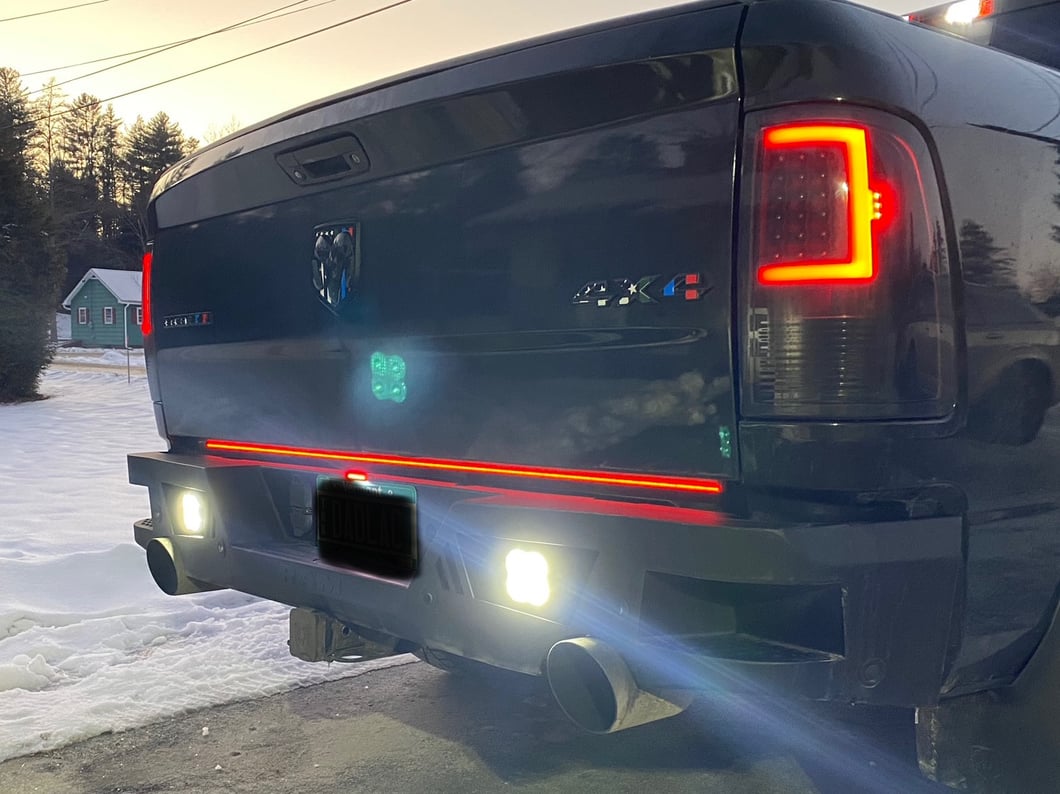 RAM Licensed by RedRock Extreme HD Rear Bumper with RAM Logo; Textured Black (09-18 RAM 1500)