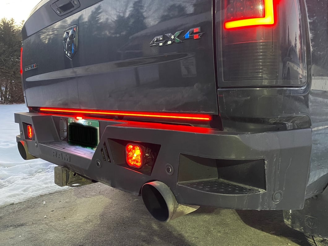 RAM Licensed by RedRock Extreme HD Rear Bumper with RAM Logo; Textured Black (09-18 RAM 1500)