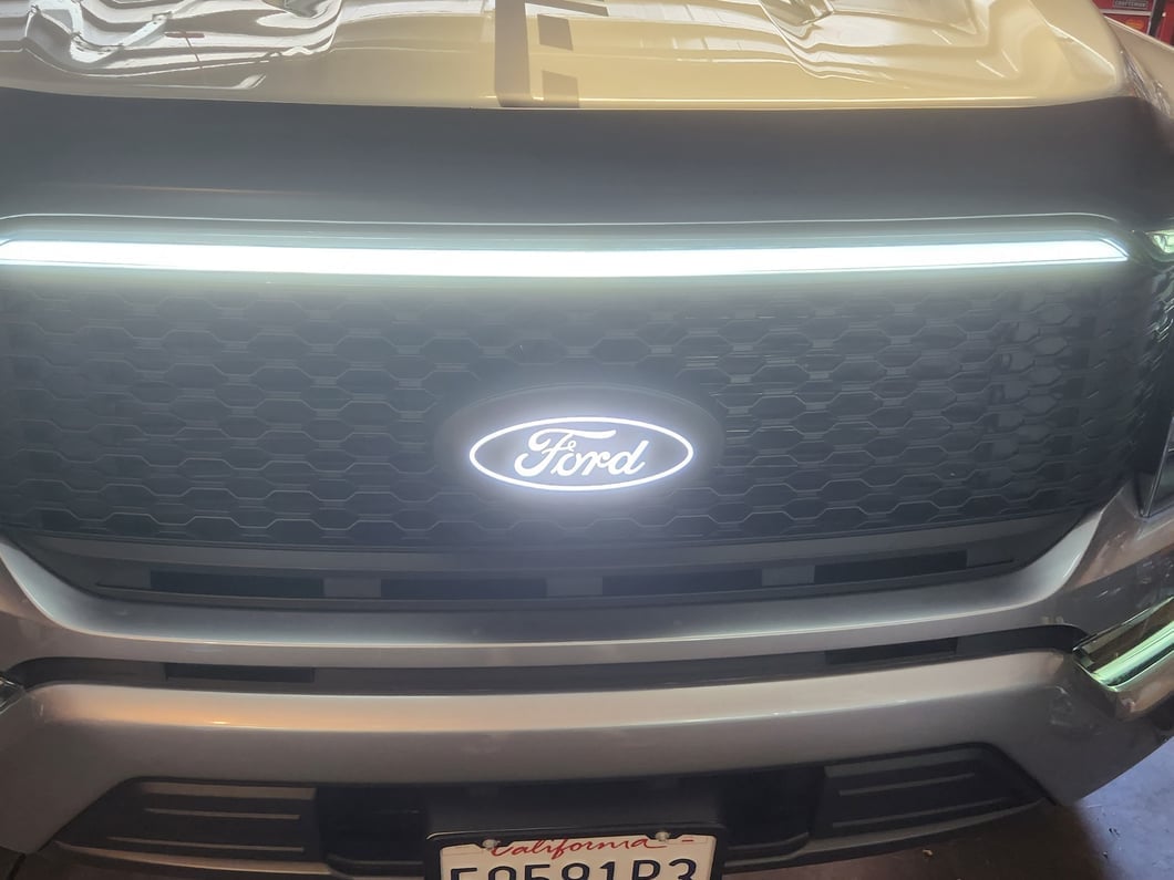 RedRock Baja Style Upper Replacement Grille with LED Light Bar and Emblem Surround (21-23 F-150, Excluding Raptor & Tremor)