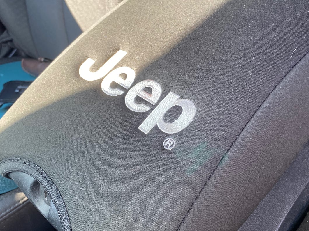 Jeep Licensed by RedRock Neoprene Center Console Arm Rest Cover with Jeep Logo; Black (11-18 Jeep Wrangler JK)