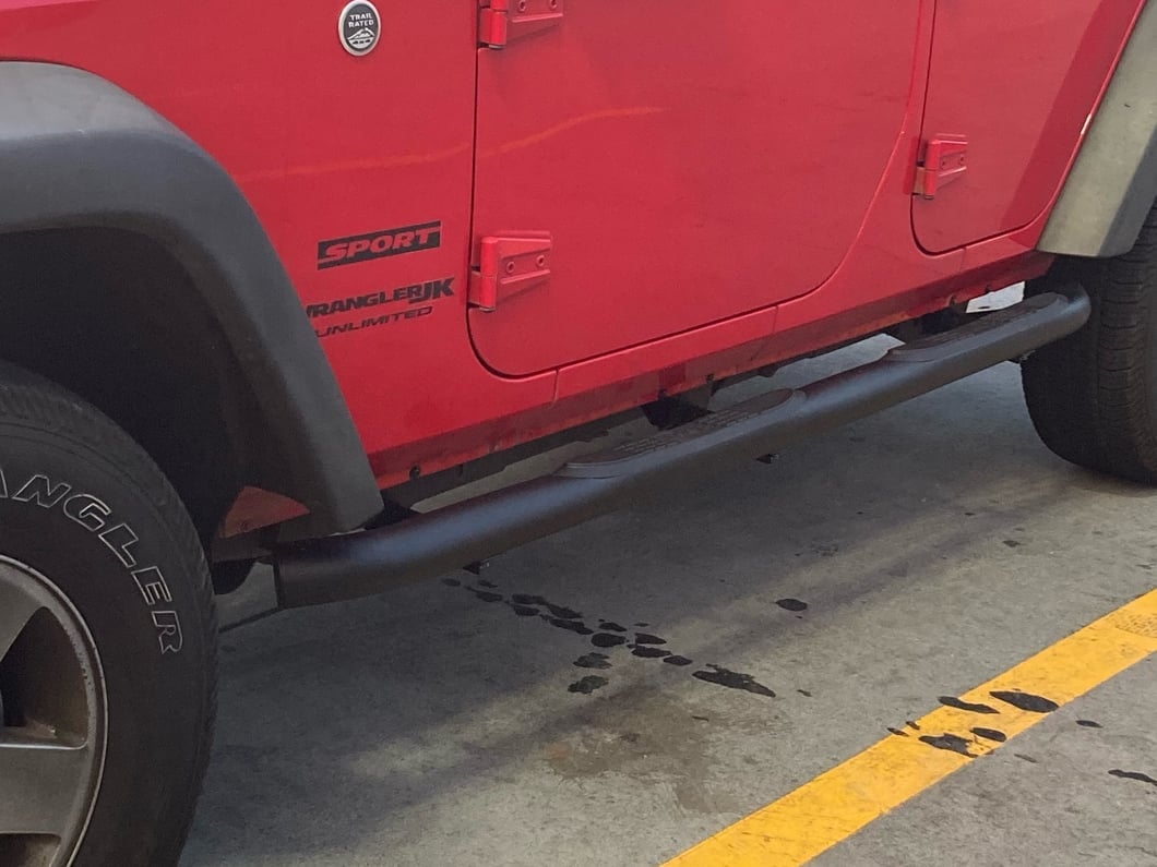 Jeep Licensed by RedRock 3-Inch Round Curved Side Step Bars with Jeep Logo; Textured Black (07-18 Jeep Wrangler JK 4-Door)