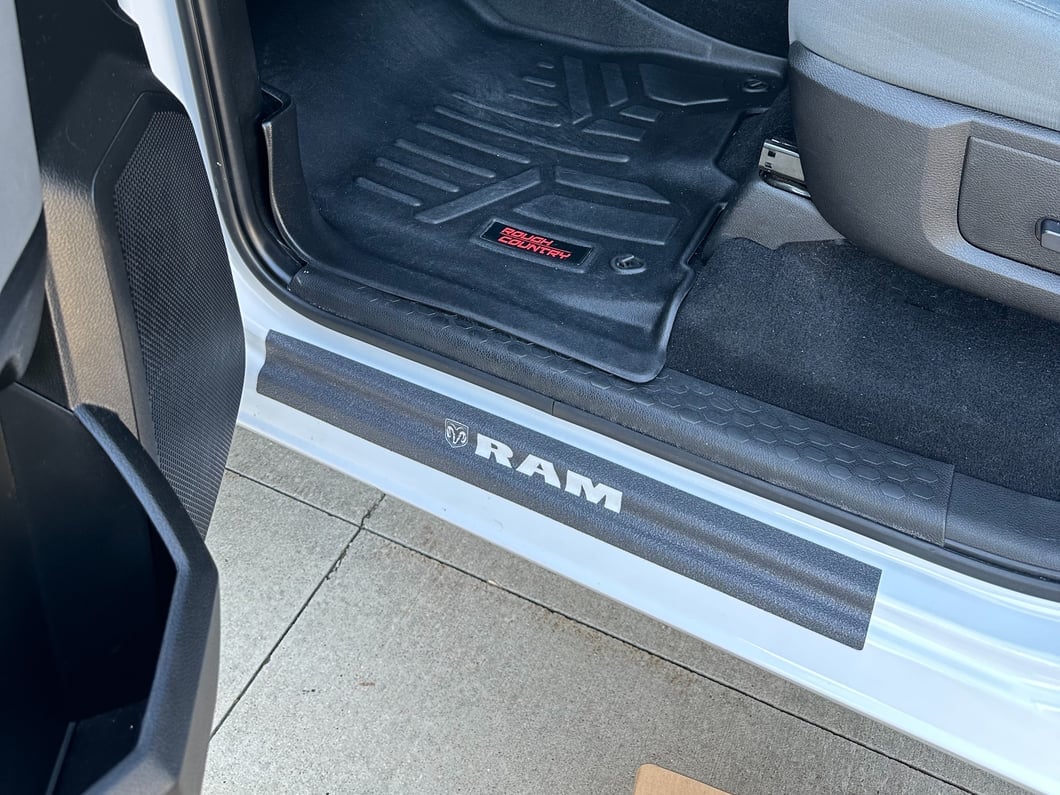 RAM Licensed by RedRock Door Sill Body Shield Decal; White (02-18 RAM 1500)