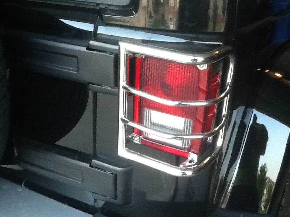 RedRock Wrap-Around Tail Light Guards; Stainless Steel (07-18 Jeep Wrangler JK)
