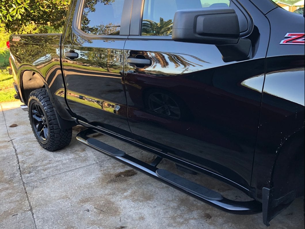RedRock 4-Inch Oval Bent End Side Step Bars; Black (19-25 Silverado 1500 Crew Cab)