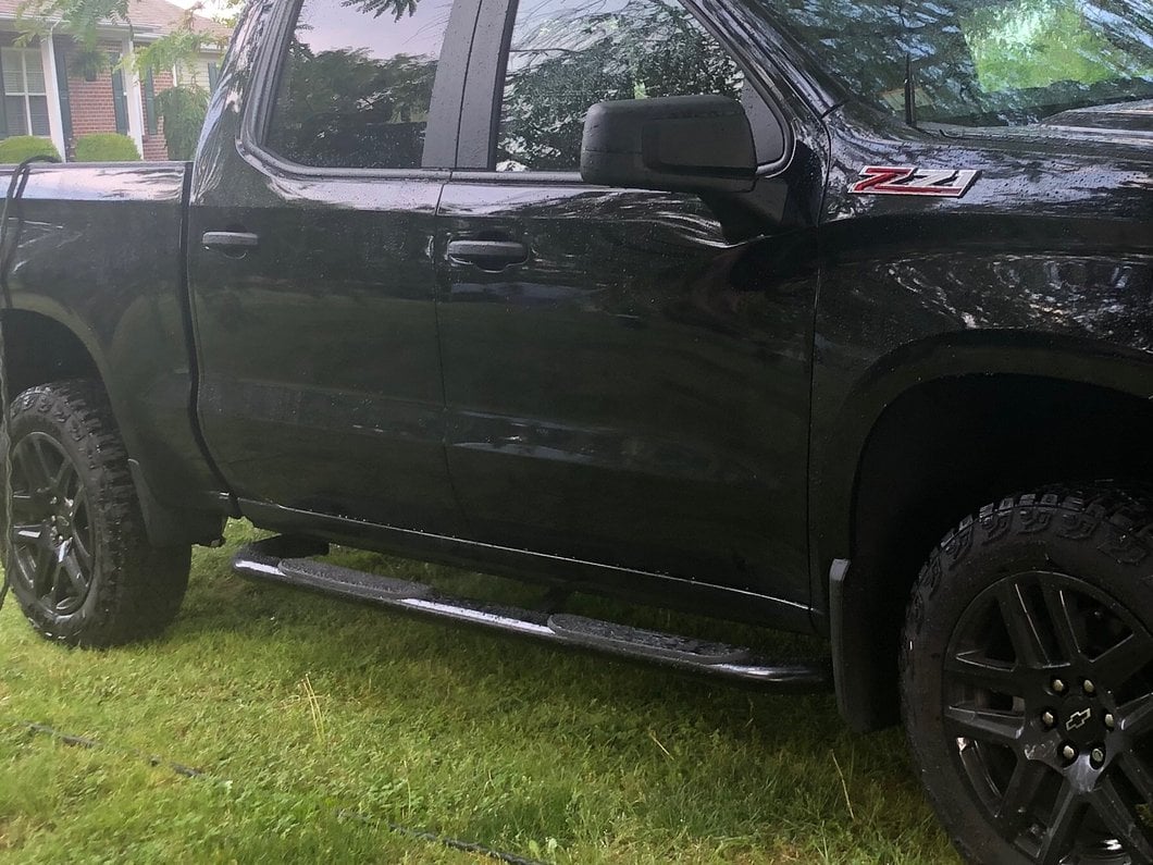 RedRock 4-Inch Oval Bent End Side Step Bars; Black (19-25 Silverado 1500 Crew Cab)
