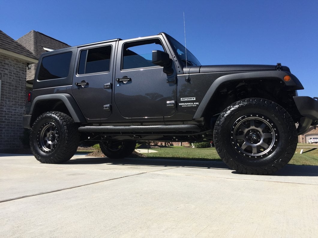 RedRock 3-Inch Round Curved Side Step Bars; Textured Black (07-18 Jeep Wrangler JK 4-Door)