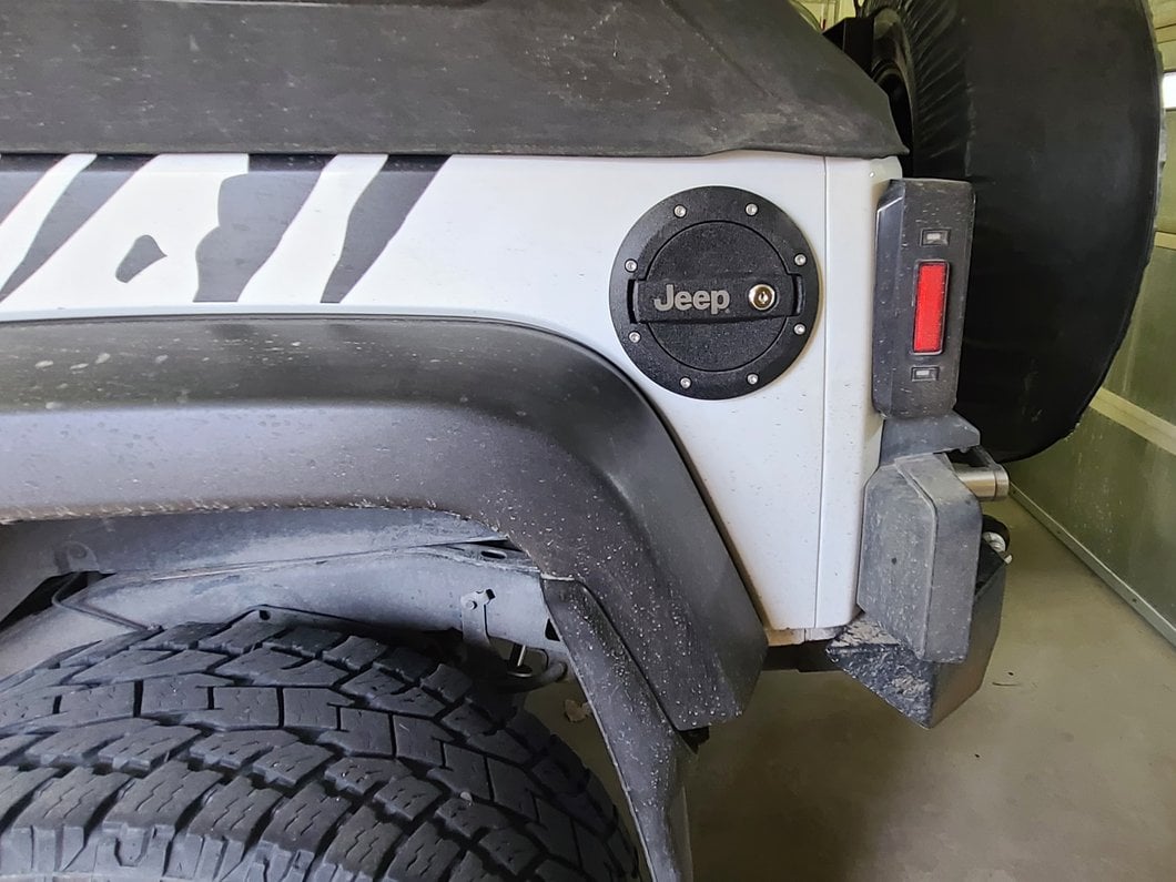 Jeep Licensed by RedRock Locking Fuel Door with Engraved Jeep Logo (07-18 Jeep Wrangler JK)