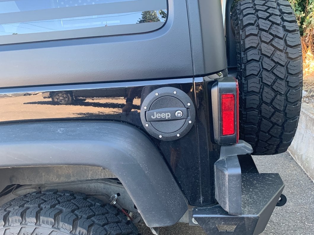 Jeep Licensed by RedRock Locking Fuel Door with Engraved Jeep Logo (07-18 Jeep Wrangler JK)