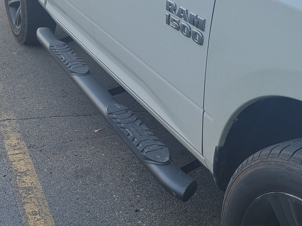 RAM Licensed by RedRock 5-Inch Oval Bent End Side Step Bars with Ram Logo; Textured Black (09-18 RAM 1500 Crew Cab)