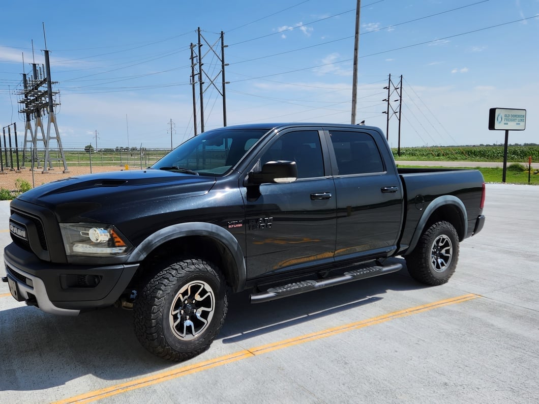 RAM Licensed by RedRock 5-Inch Oval Bent End Side Step Bars with Ram Logo; Textured Black (09-18 RAM 1500 Crew Cab)