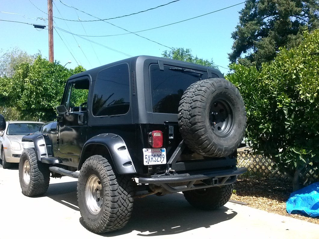 RedRock Tubular Rock Crawler Rear Bumper with Tire Carrier; Textured Black (97-06 Jeep Wrangler TJ)