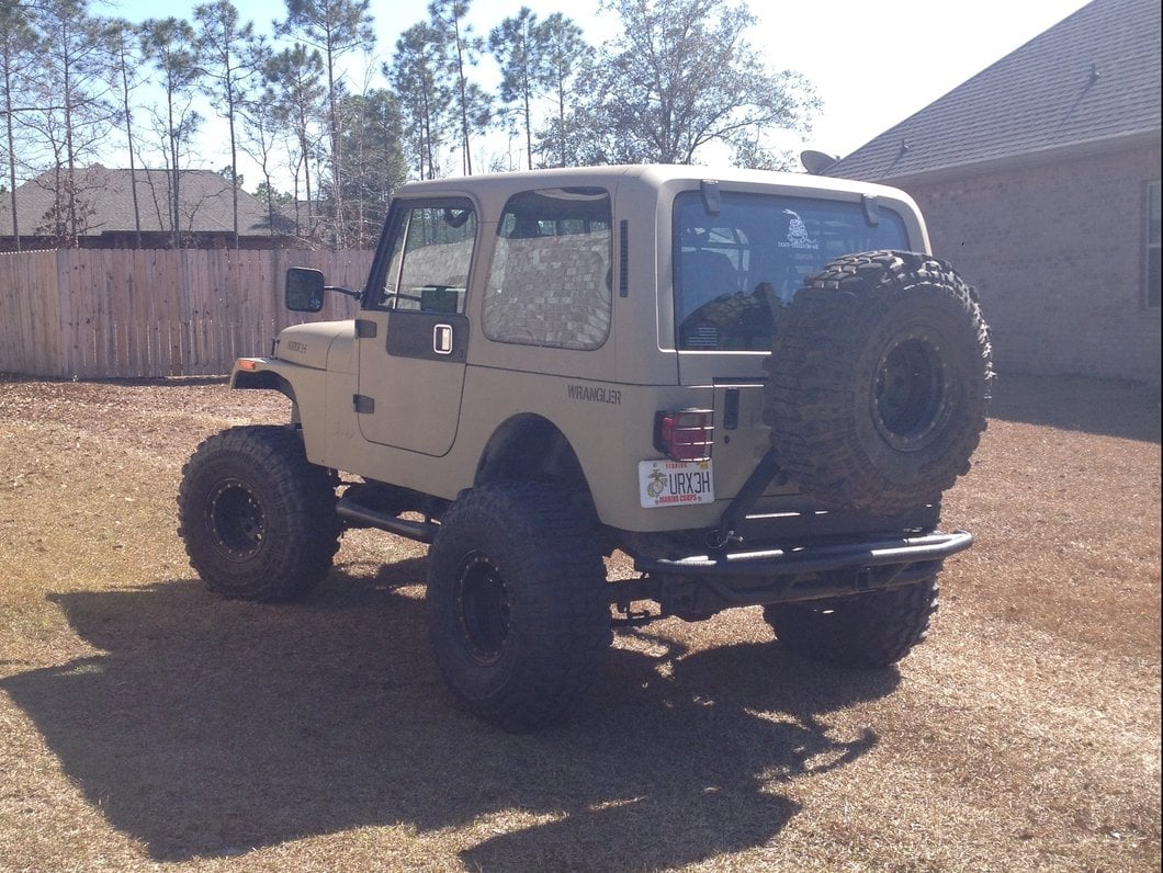 RedRock Tubular Rock Crawler Rear Bumper with Tire Carrier; Textured Black (97-06 Jeep Wrangler TJ)