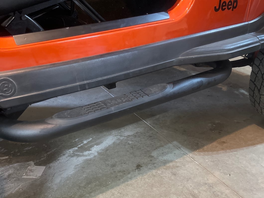 Jeep Licensed by RedRock 3-Inch Round Side Step Bars with Jeep Logo; Textured Black (87-06 Jeep Wrangler YJ & TJ, Excluding Unlimited)