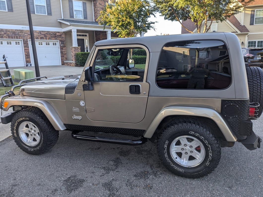 Jeep Licensed by RedRock 3-Inch Round Side Step Bars with Jeep Logo; Semi-Gloss Black (87-06 Jeep Wrangler YJ & TJ, Excluding Unlimited)
