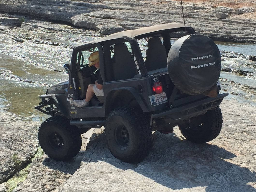 RedRock Tubular Rock Crawler Rear Bumper with Tire Carrier; Textured Black (97-06 Jeep Wrangler TJ)