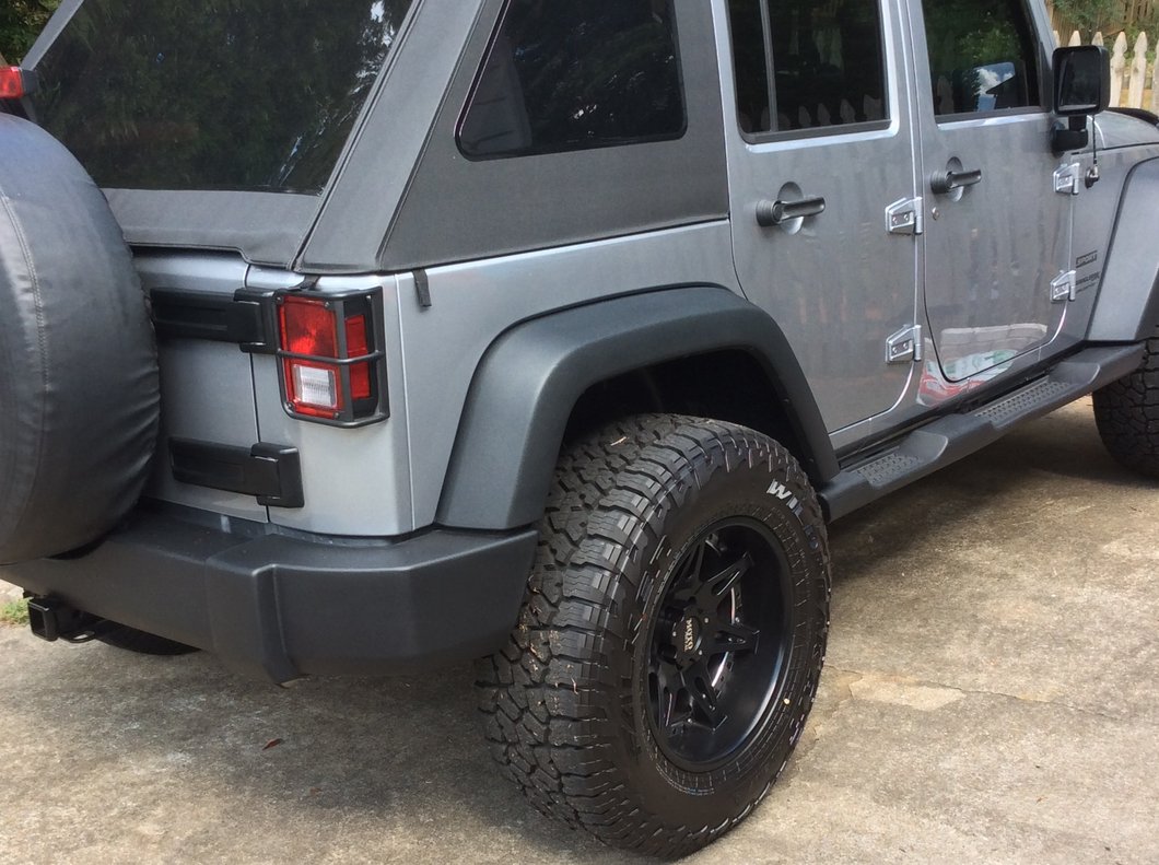 RedRock OE Style Tail Light Guards; Black (07-18 Jeep Wrangler JK)