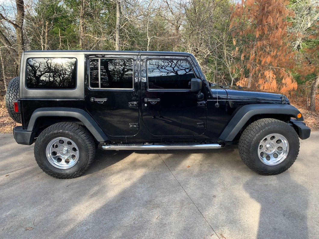 RedRock 3-Inch Round Curved Side Step Bars; Stainless Steel (07-18 Jeep Wrangler JK 4-Door)