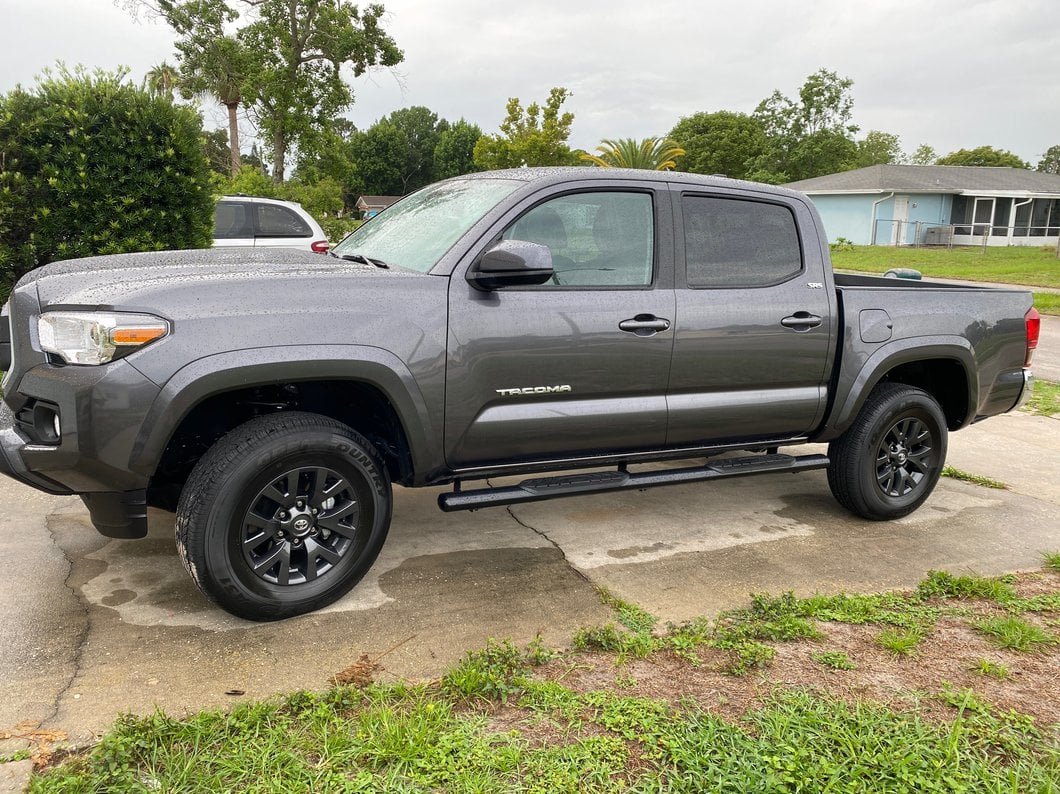RedRock 4-Inch Oval Straight End Side Step Bars; Black (05-23 Tacoma Double Cab)