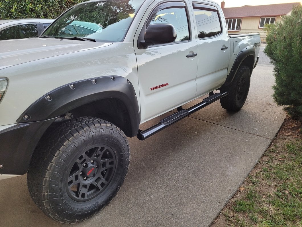 RedRock 4-Inch Oval Straight End Side Step Bars; Black (05-23 Tacoma Double Cab)